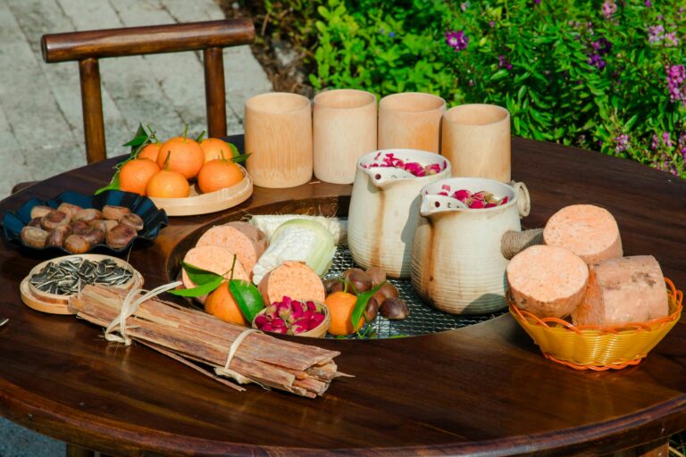 A healthy Mediterranean diet meal plan with grilled salmon, fresh salad, and quinoa on a wooden table.